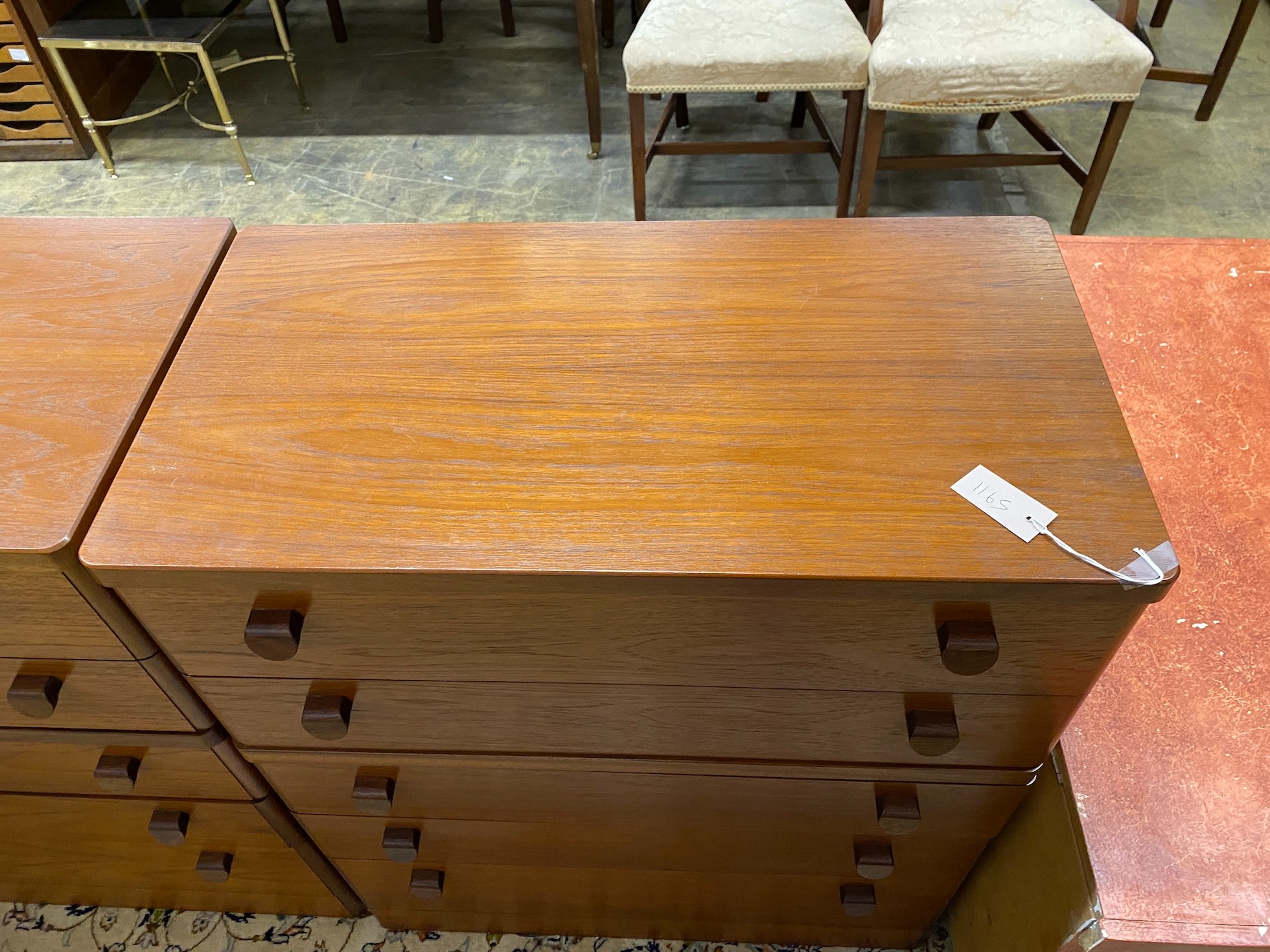 A pair of mid century Stag teak five drawer bedside chests, width 82cm, depth 44cm, height 96cm